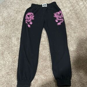black sweatpants with pink dragons!!